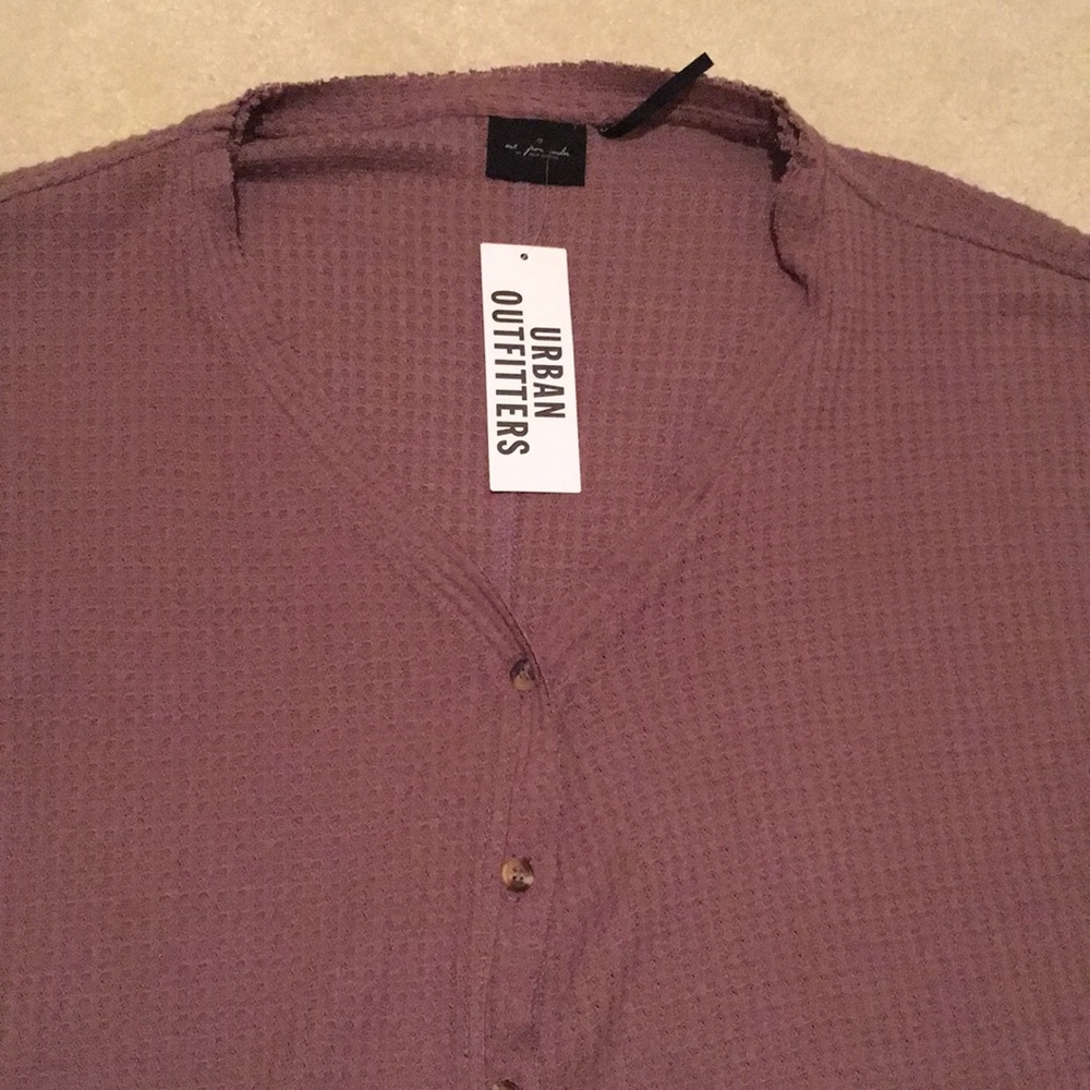 Oversized thermal button top